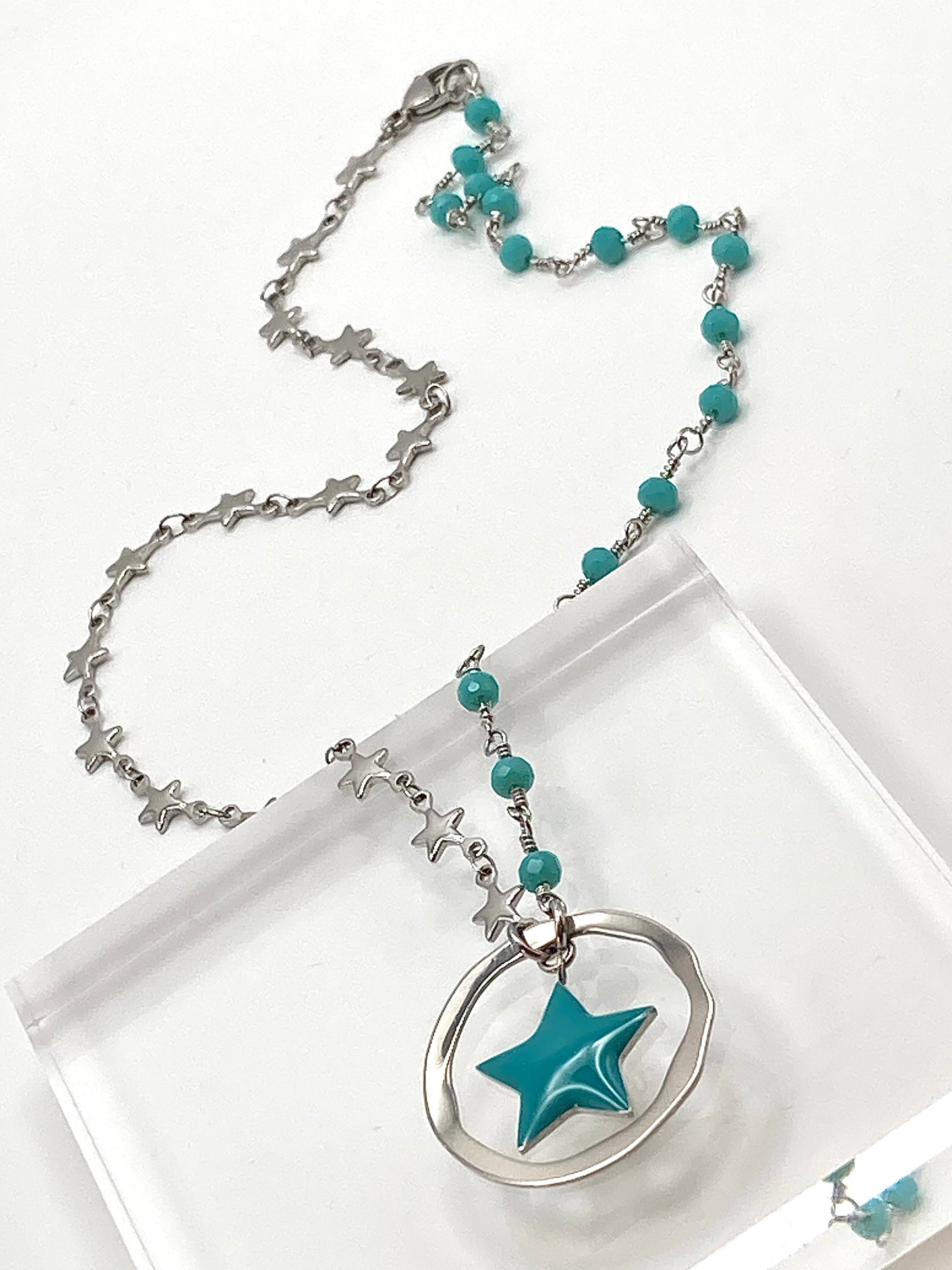 Rosary necklace with steel star