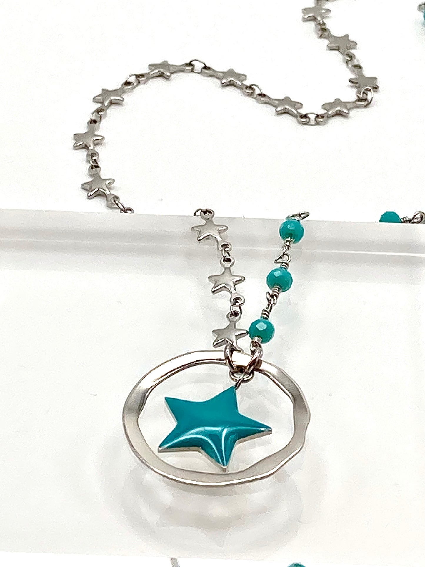 Rosary necklace with steel star