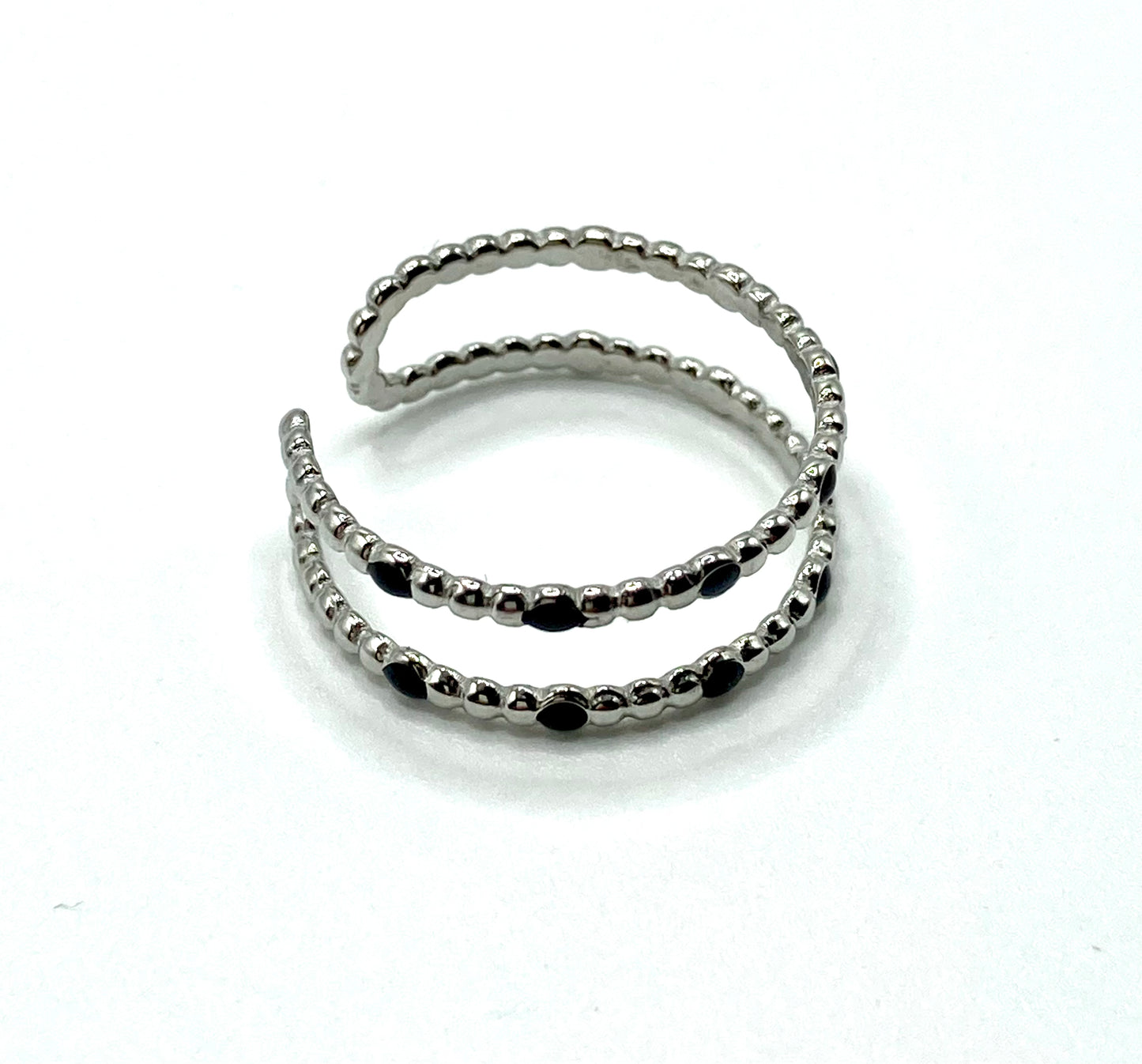 Anello a fascia a pois neri