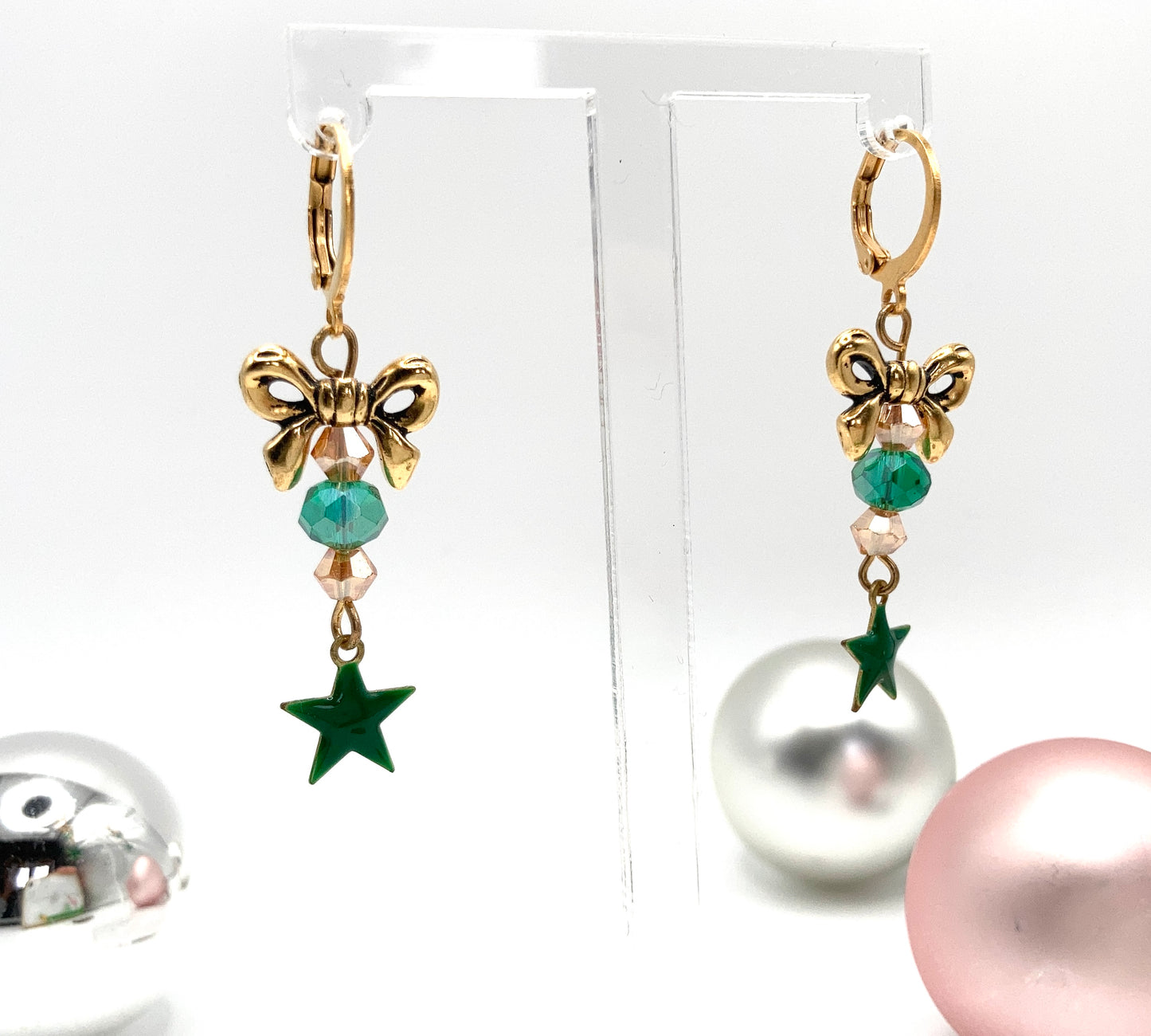 Orecchini con fiocco e stellina