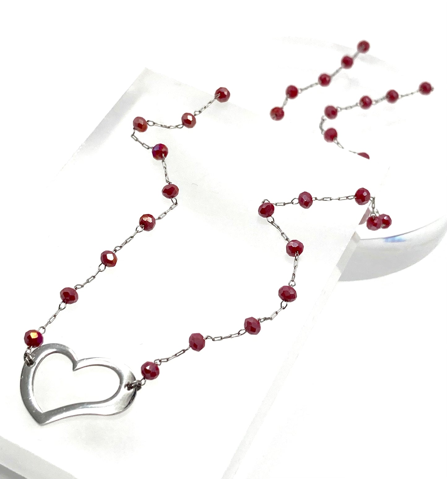Collana con cristalli e cuore vuoto