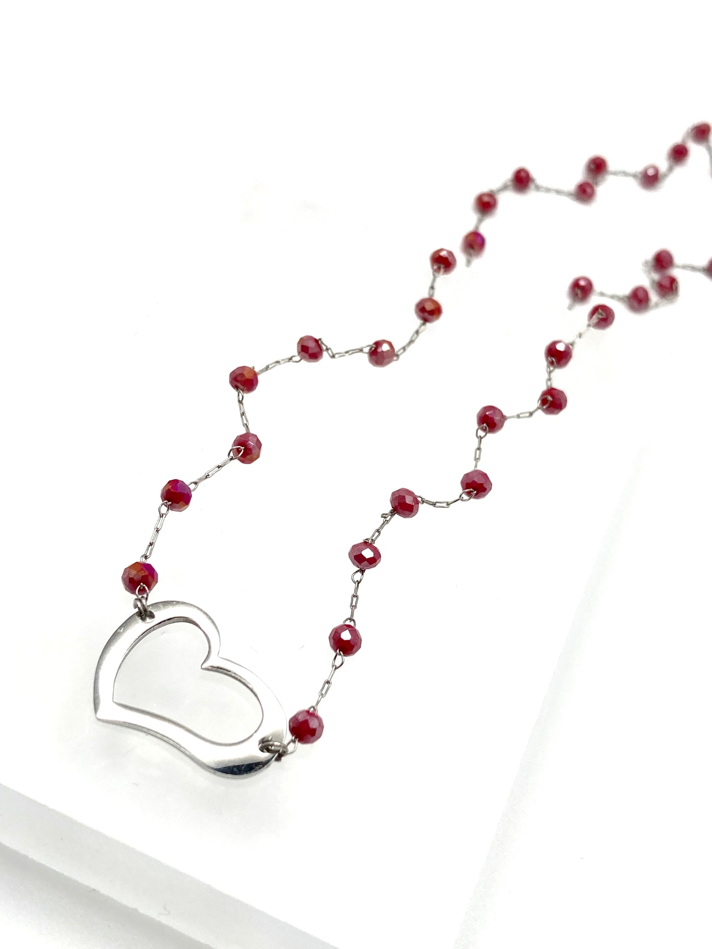 Collana con cristalli e cuore vuoto