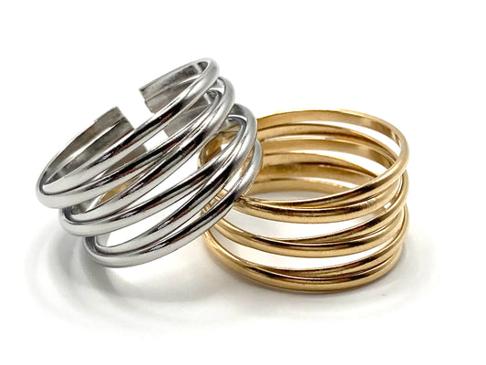 Anello a fascia intrecciato