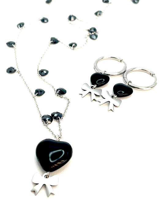 Collana e orecchini in acciaio con fiocco