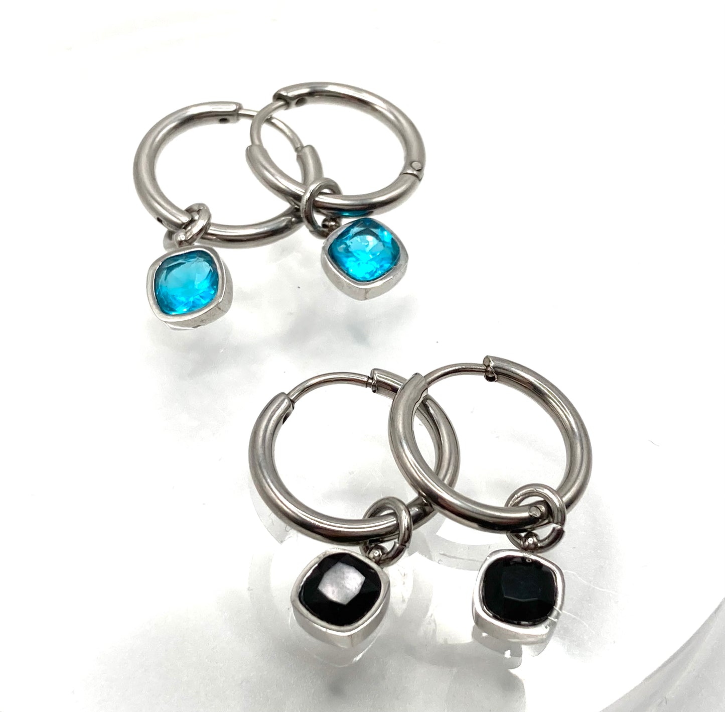 Orecchini a cerchio punto luce