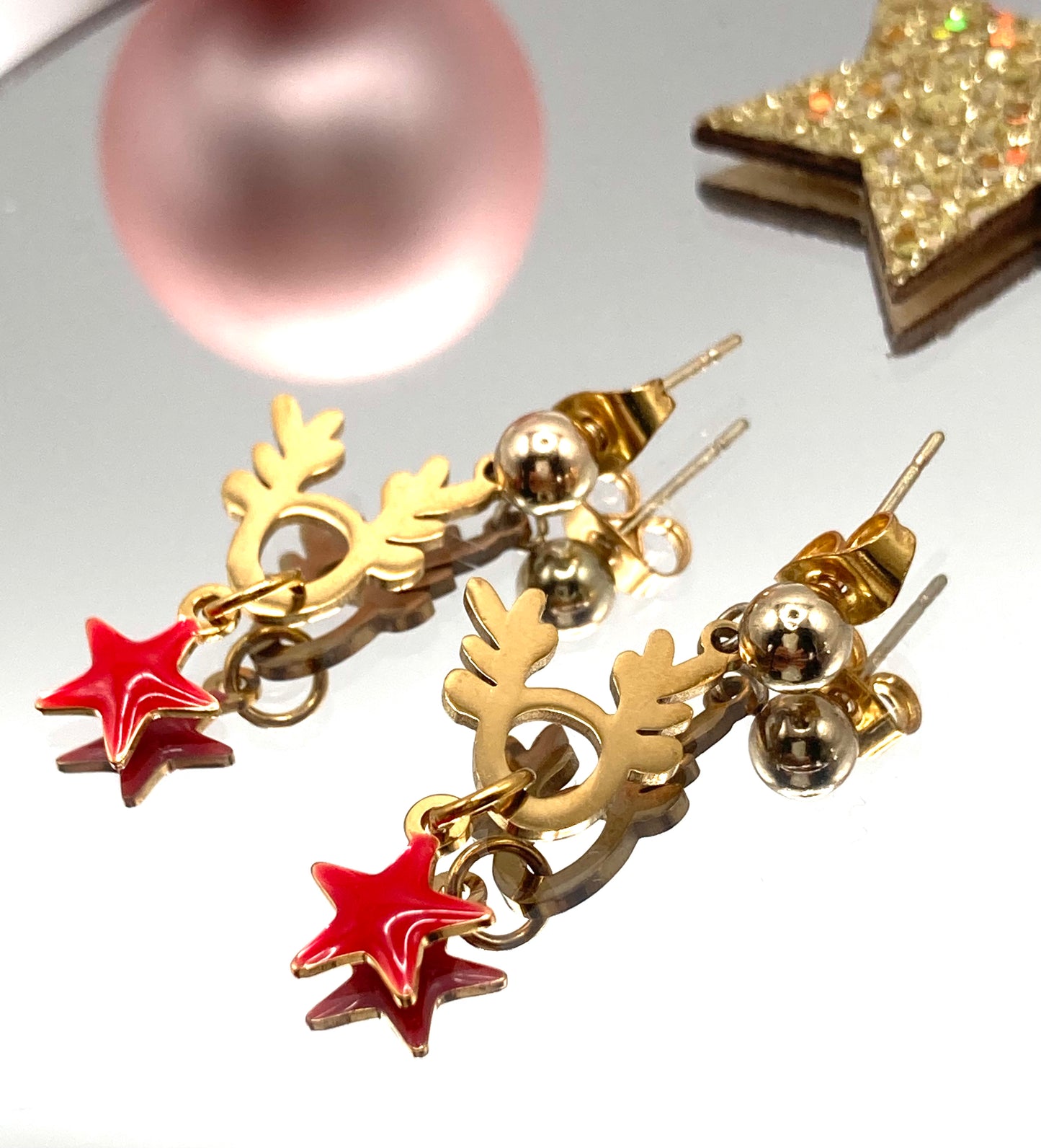 Orecchini con renna e stellina