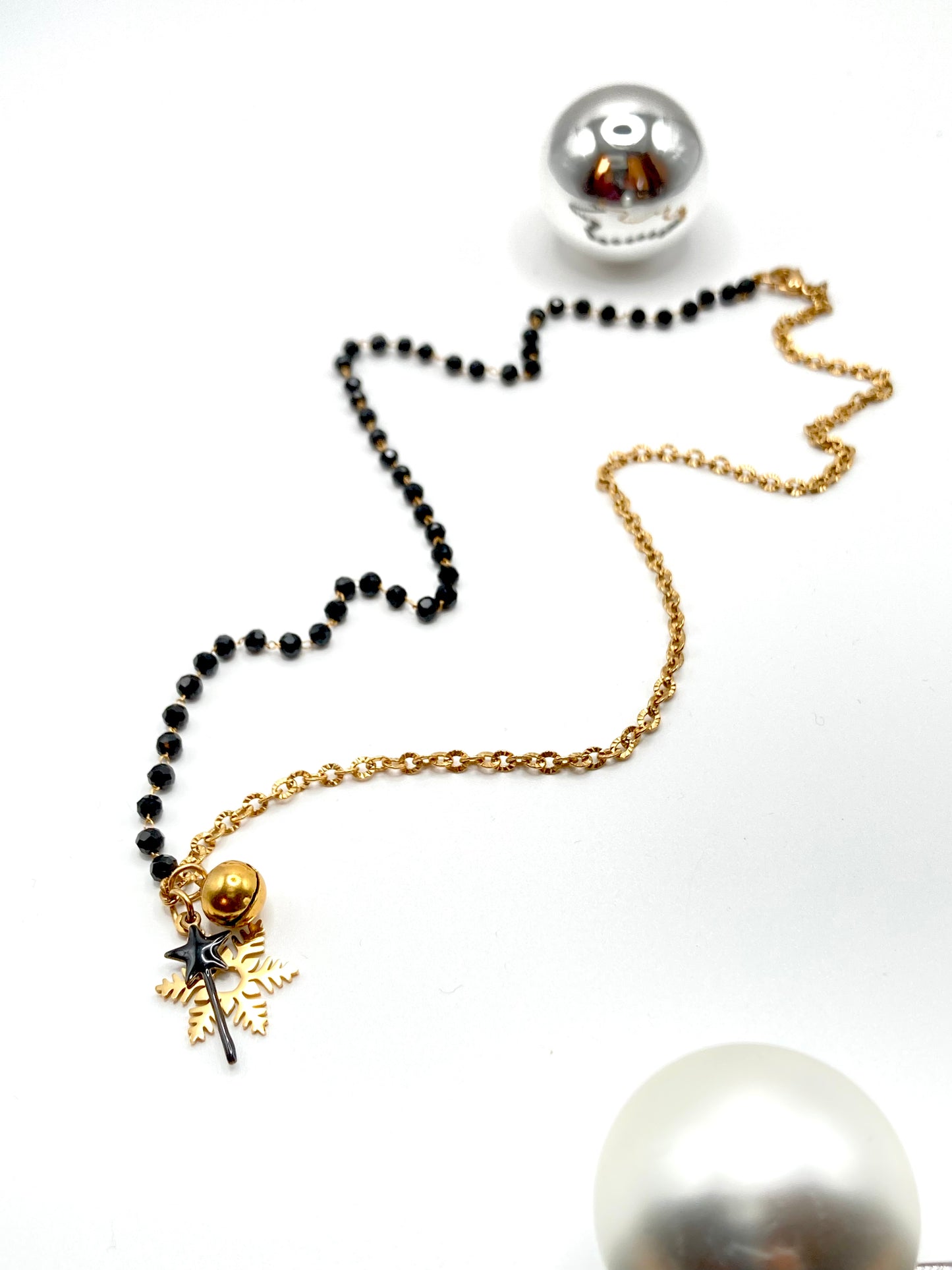 Collana rosario con bacchetta magica