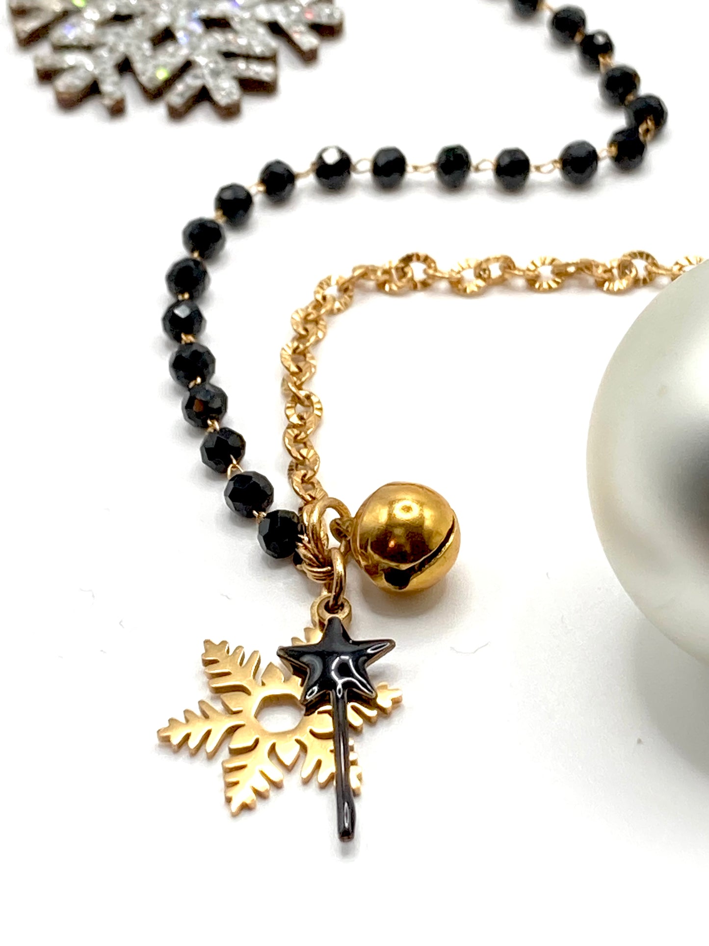 Collana rosario con bacchetta magica