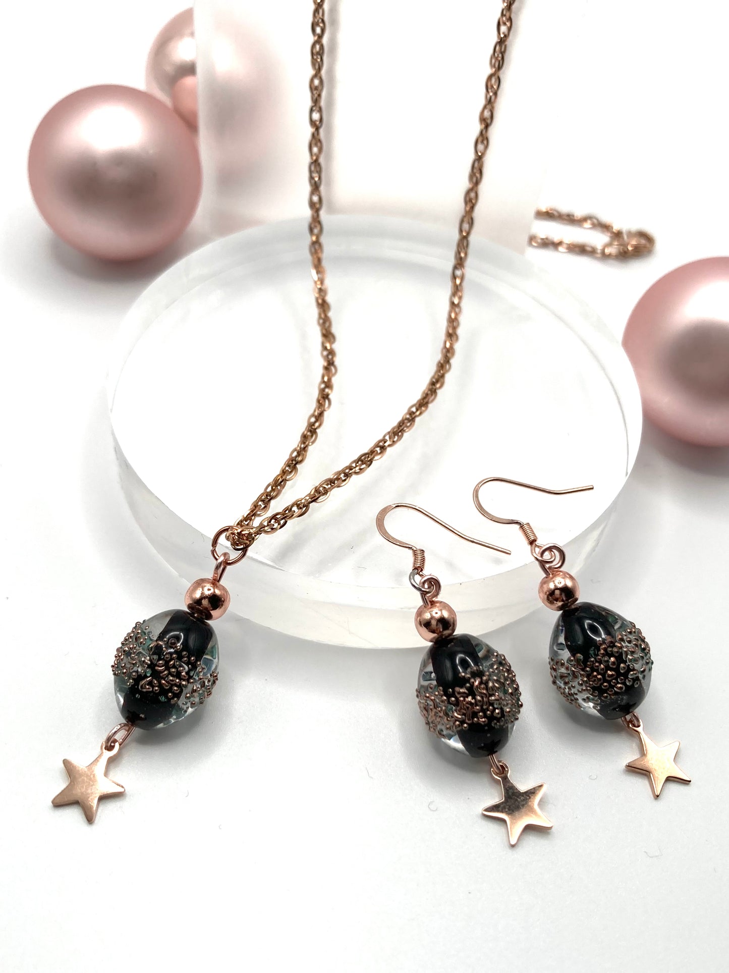 Collana e orecchini con stelline