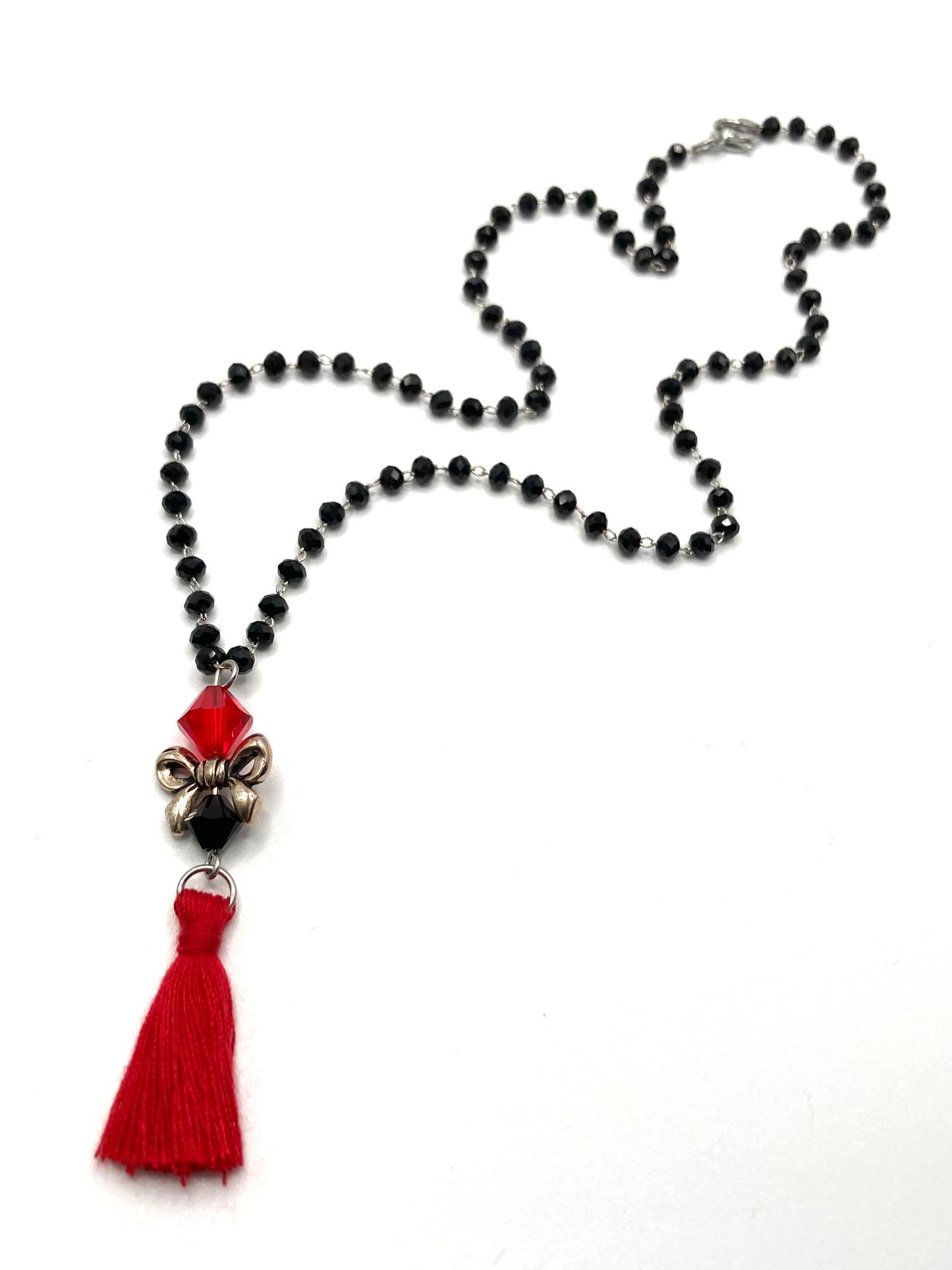 Collana e orecchini con nappina