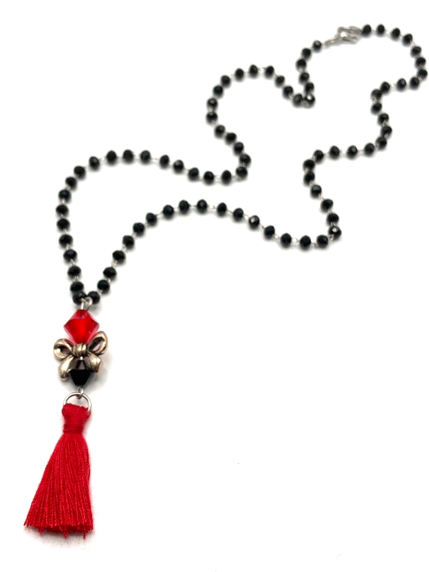 Collana e orecchini con nappina