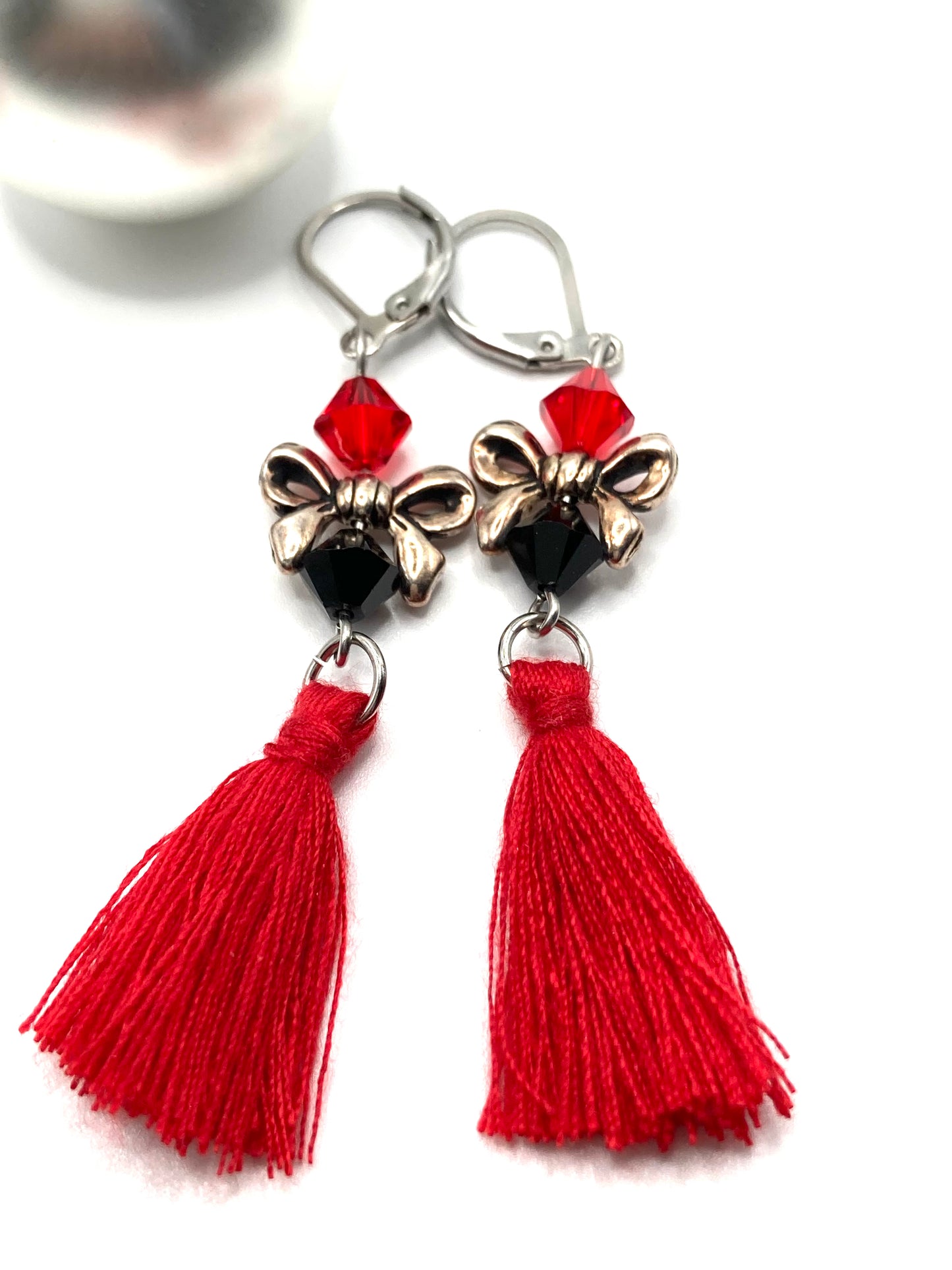 Collana e orecchini con nappina