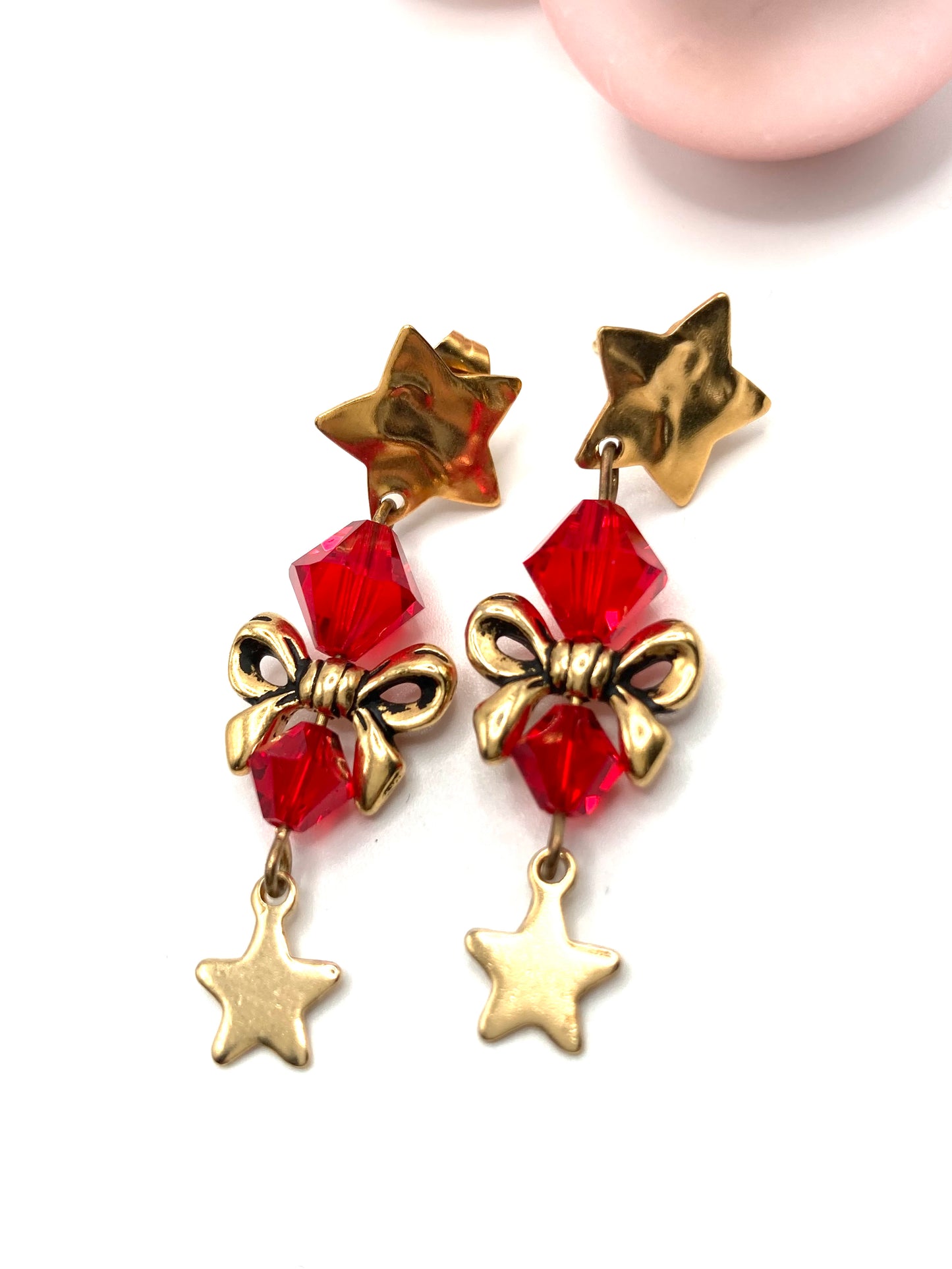 Orecchini con fiocco e stellina