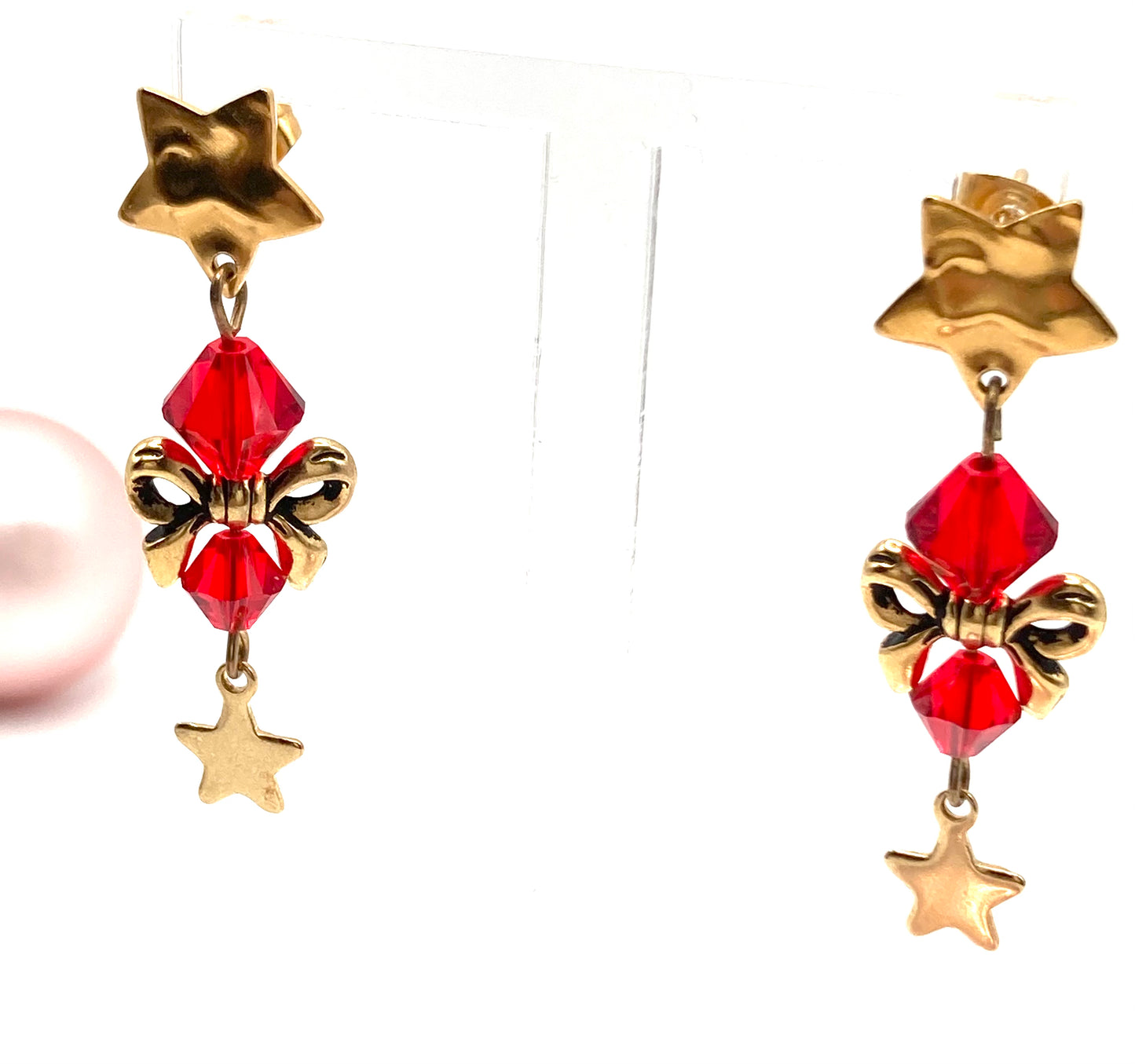 Orecchini con fiocco e stellina