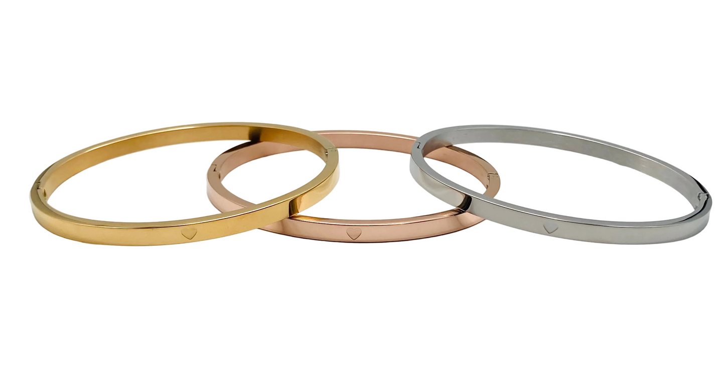 Bracciale rigido in acciaio con cuoricino