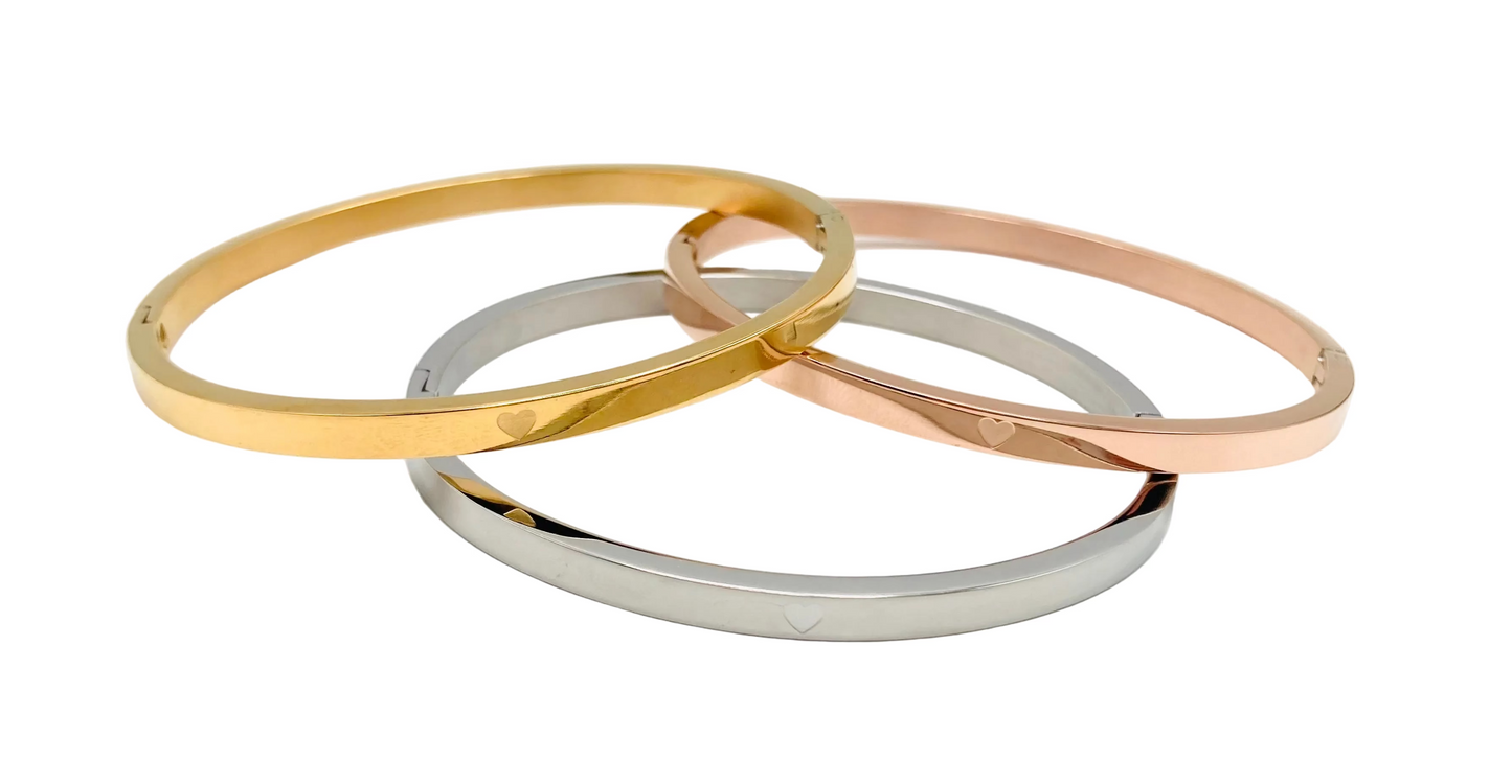 Bracciale rigido in acciaio con cuoricino